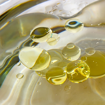 oil bubbles in the forefront of an oily background