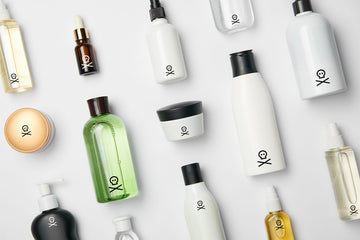 an image of cosmetic bottles with a skull and crossbones symbol on each on a white background