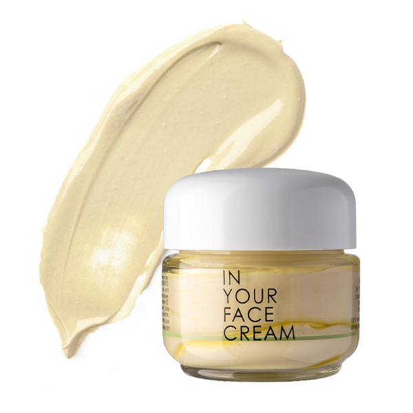 an image of the IN YOUR FACE CREAM on a white background with a butter yellow smear of the cream