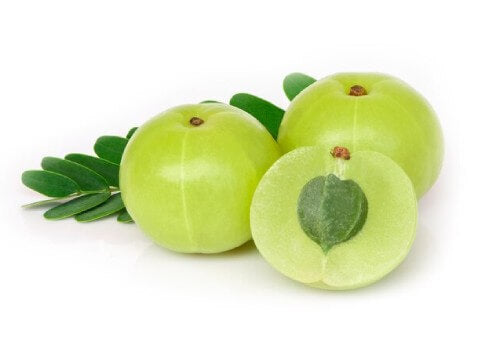 an image showing Amla fruit, one cut open