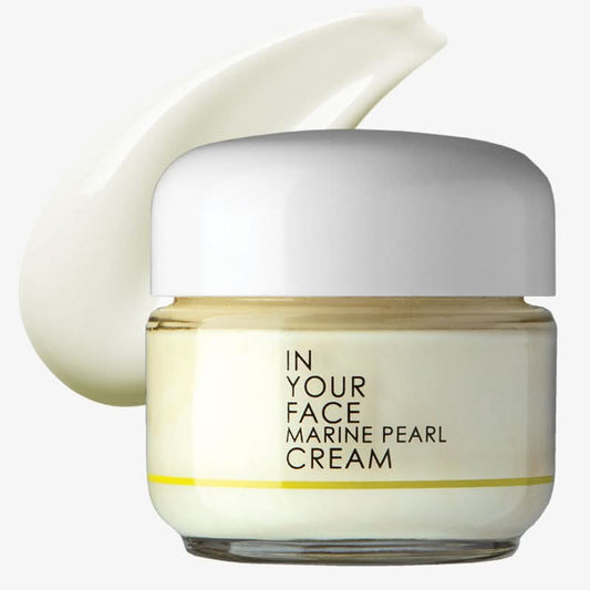 Jar of 'In Your Face Marine Pearl Cream' with a white cap on a white background