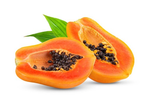 a papaya cut in half on a white background