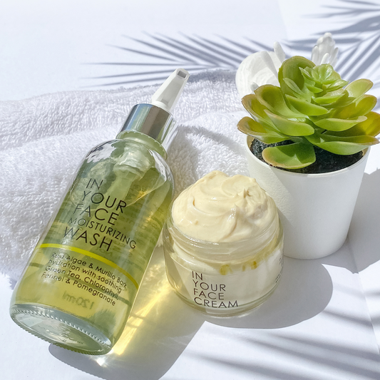 GET UP AND GLOW DUO next to towels and a plant