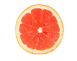 grapefruit slice on a white background