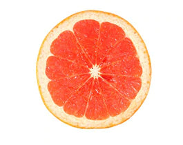 slice of grapefruit on white background