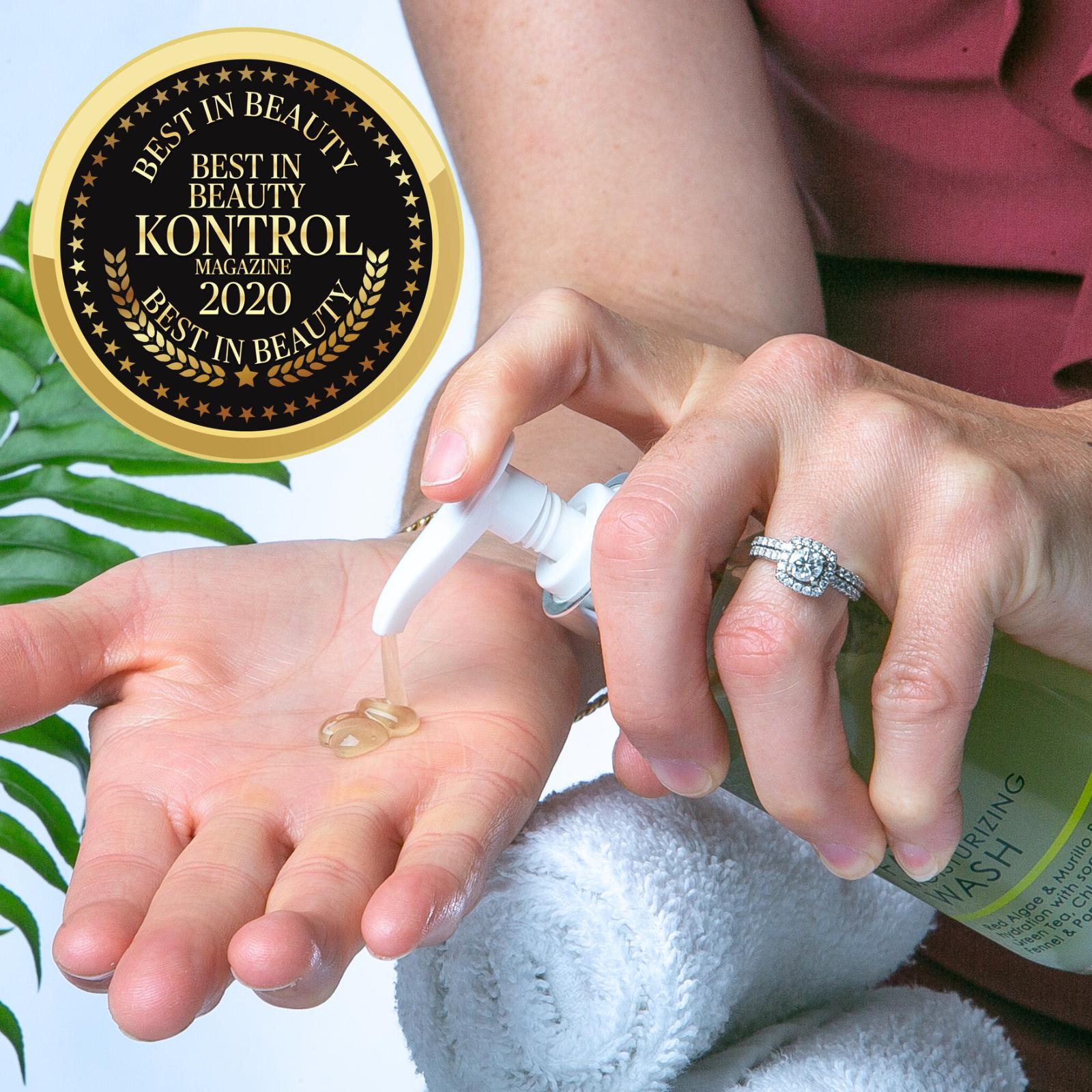 A photo of the MOISTURIZING WASH being pumped into the palm of someone's hand. A badge over the image says "Best in Beauty: Kontrol Magazine 2020".