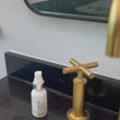 a woman showing how to apply the PLUMPING SERUM.