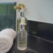 Denice Duff applying the CLARIFYING SERUM.