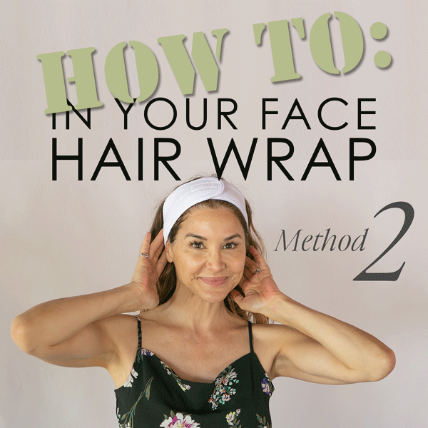 an image of Denice showing method #2 of putting on the HAIR WRAP: METHOD #2  Put one end behind your neck and bring it through to the front. Holding both ends around your neck in the front, you will feel the connection strips both facing the same direction. Grab both ends of the WRAP and pull upward and place the scratchy connection strip side down first then place the fuzzy side down on top of it, pulling to a comfortable tightness.