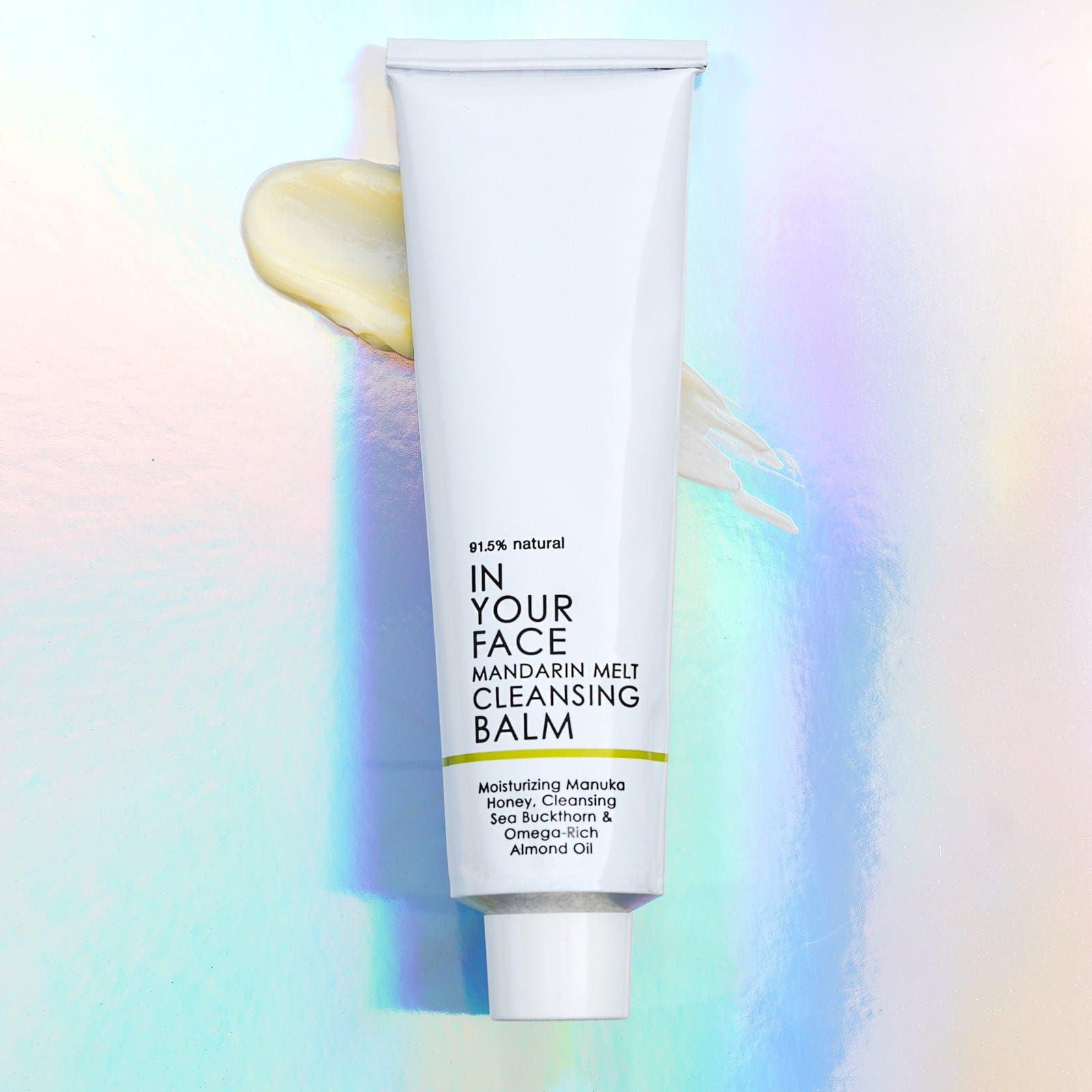MANDARIN MELT CLEANSING BALM on holographic background.