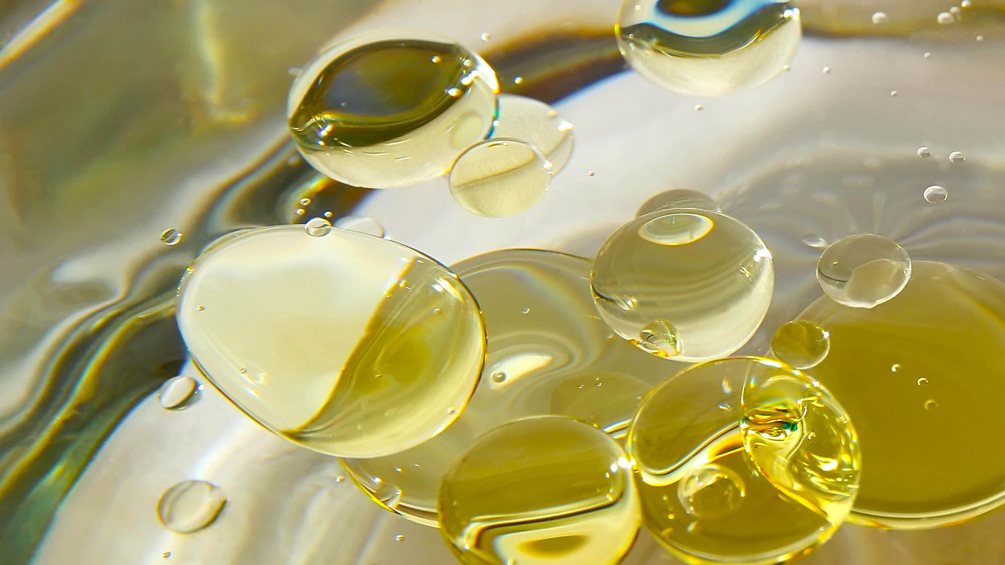 oil bubbles in the forefront of an oily background