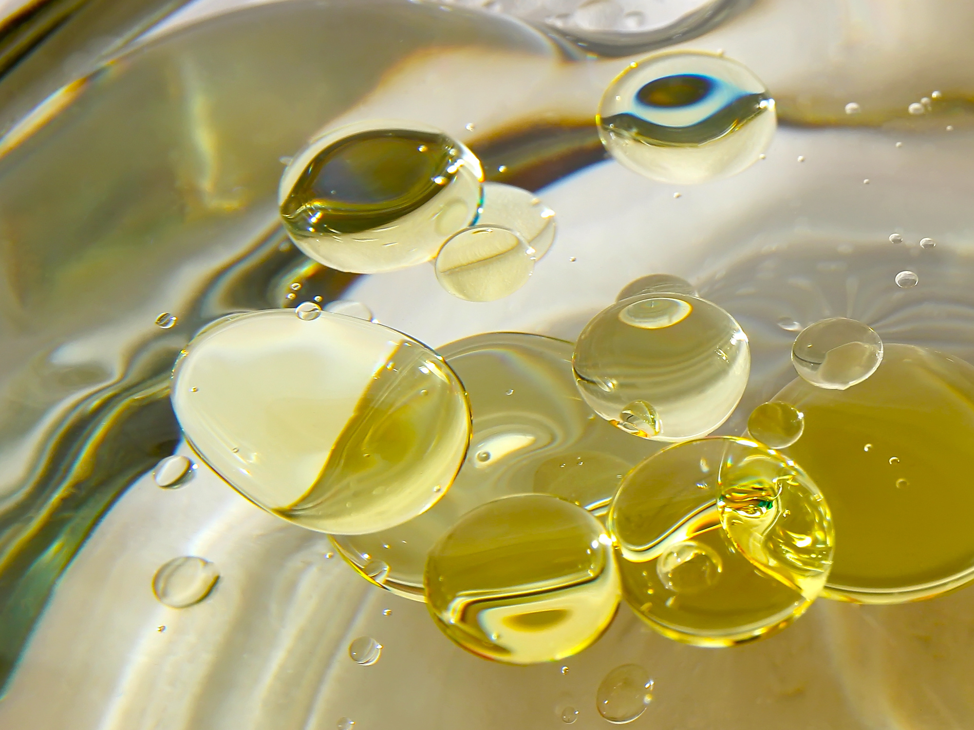 oil bubbles in the forefront of an oily background