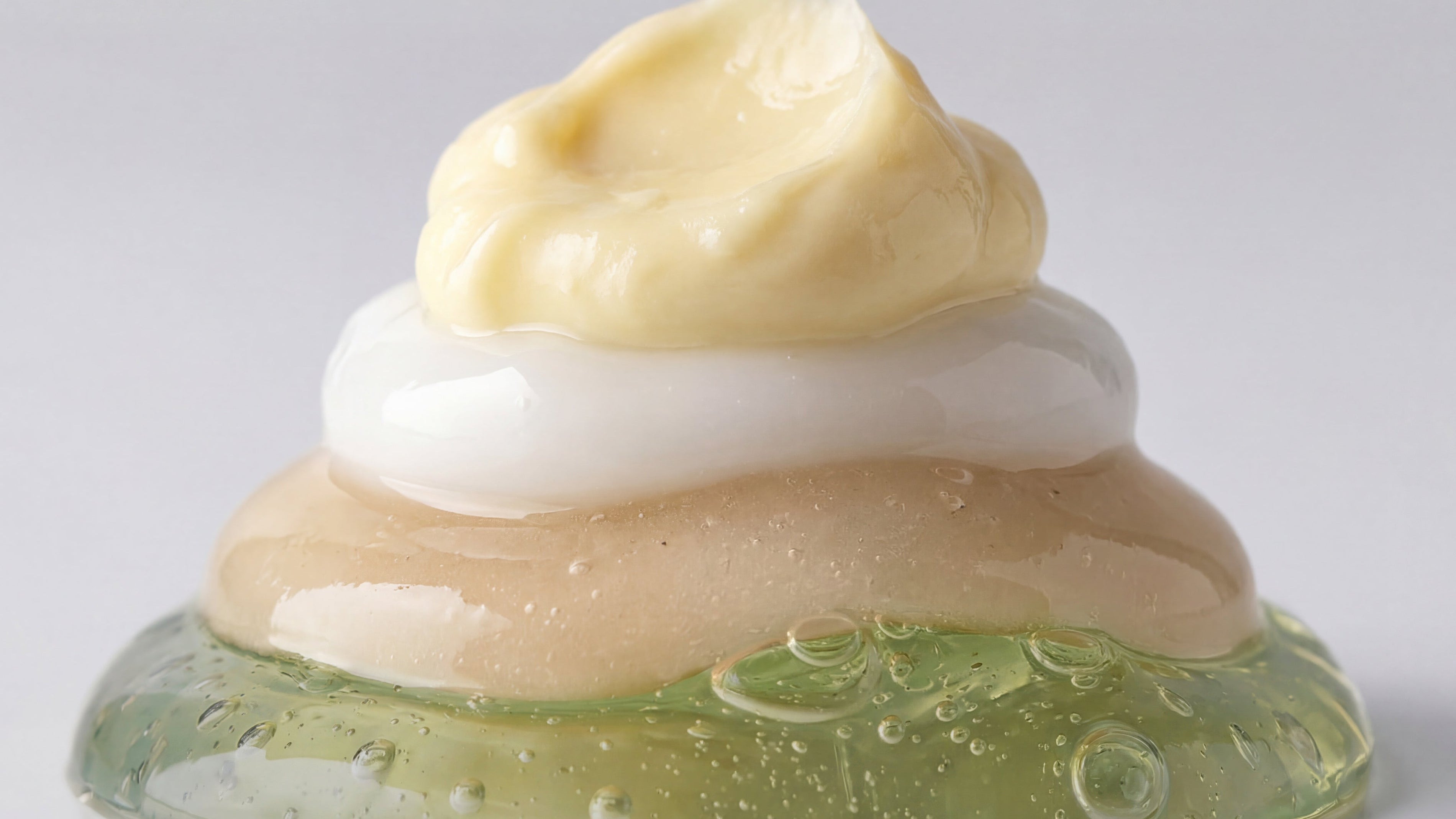 layers of skincare products in stack