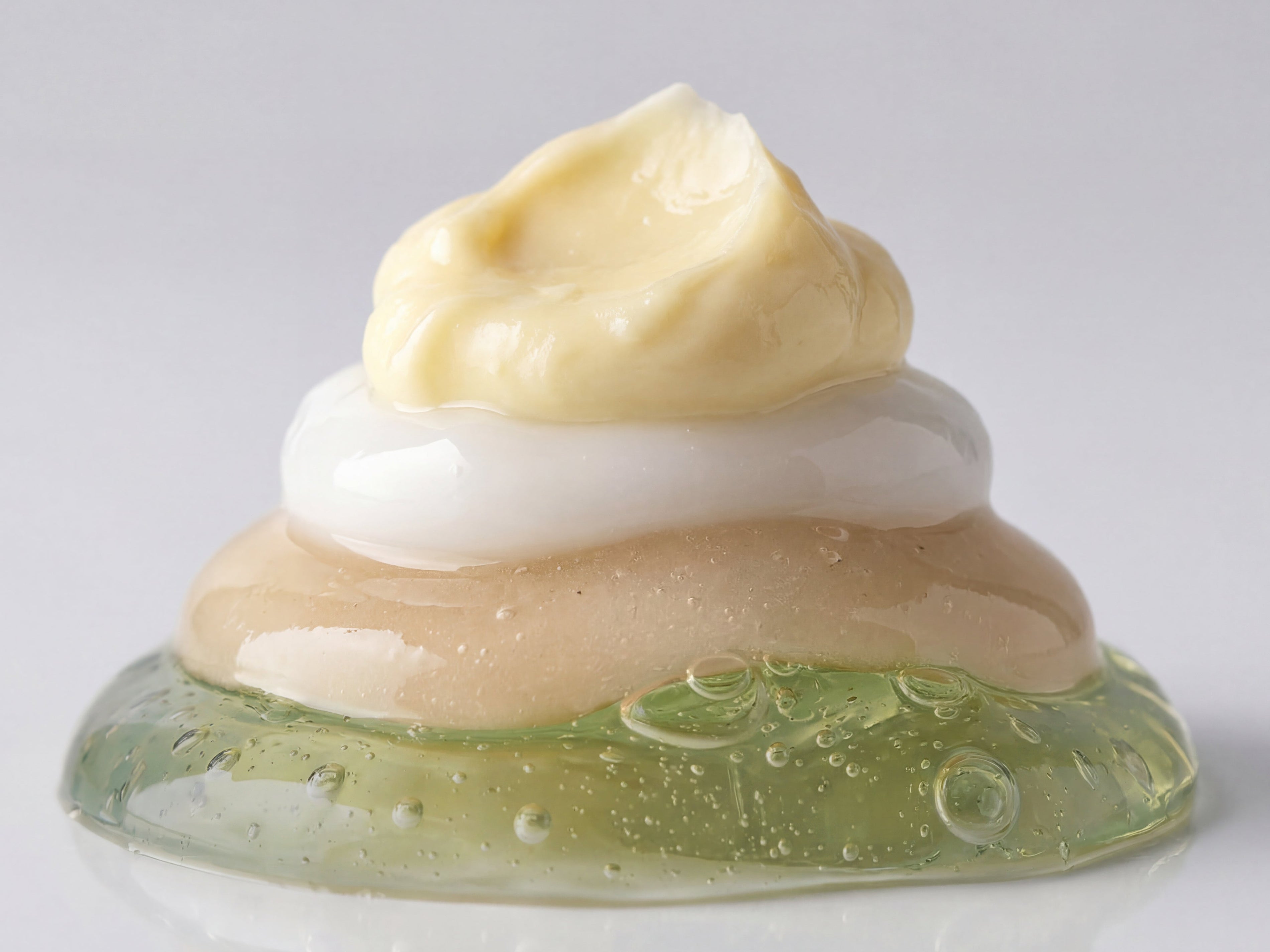 layers of skincare products in stack
