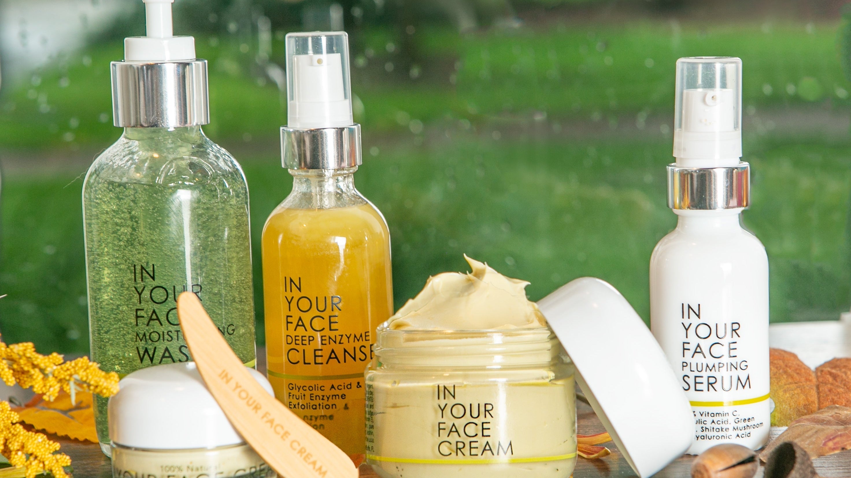 a group of products on a green, outdoorsy background