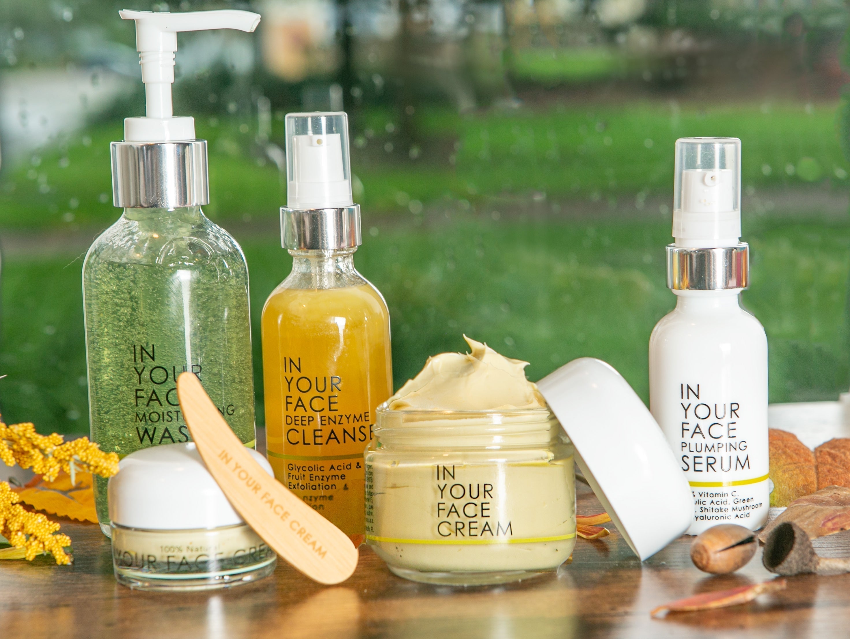 a group of products on a green, outdoorsy background