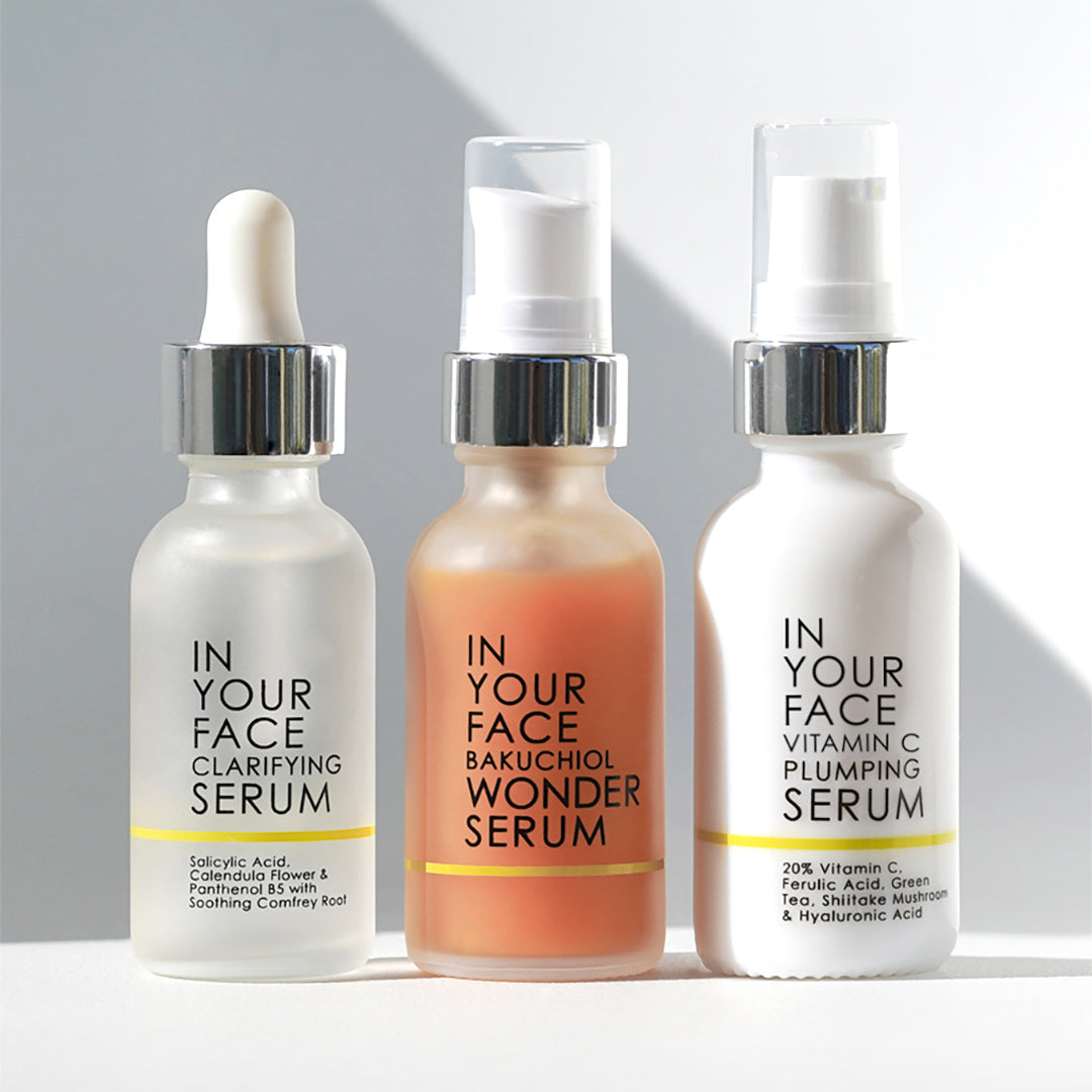 Image of 3 bottles of serums on white background with shadow