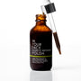 An amber glass dropper bottle of IN YOUR FACE BAMBOO REFINING POLISH with a glass pipette resting against the open bottle, on a clean white background.