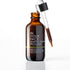 An amber glass bottle of IN YOUR FACE BAMBOO REFINING POLISH with a glass dropper containing brown liquid, set against a clean white background.