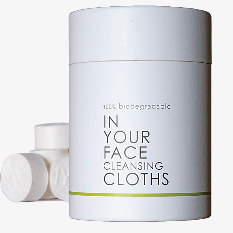 White container of 'IN YOUR FACE' cleansing cloths with text on a white background