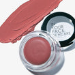Pink cosmetic cream in a jar with a swatch of color next to it, branded 'In Your Face Skincare'.