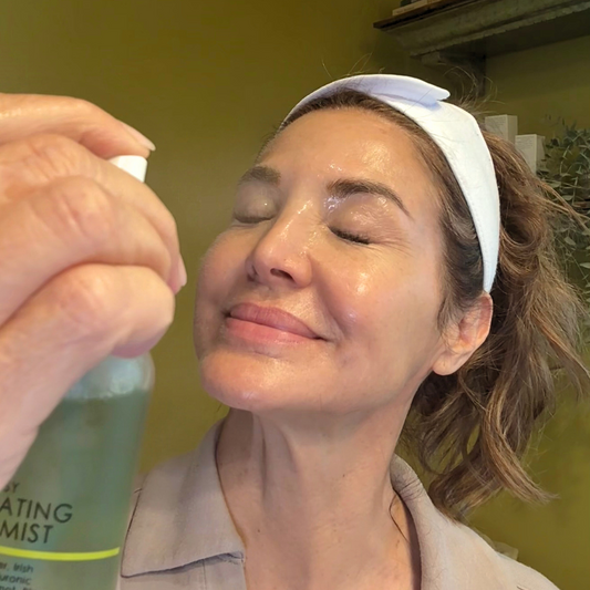 denice spraying face with BLUE TANSY HYDRATING FACE MIST