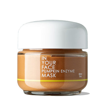 a clean photo of the PUMPKIN ENZYME MASK on a white background with a shadow under the jar. The photo shows the MASK to be a burnt orange color.