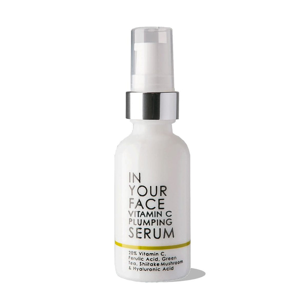image of vitamin c plumping serum bottle on a white background.