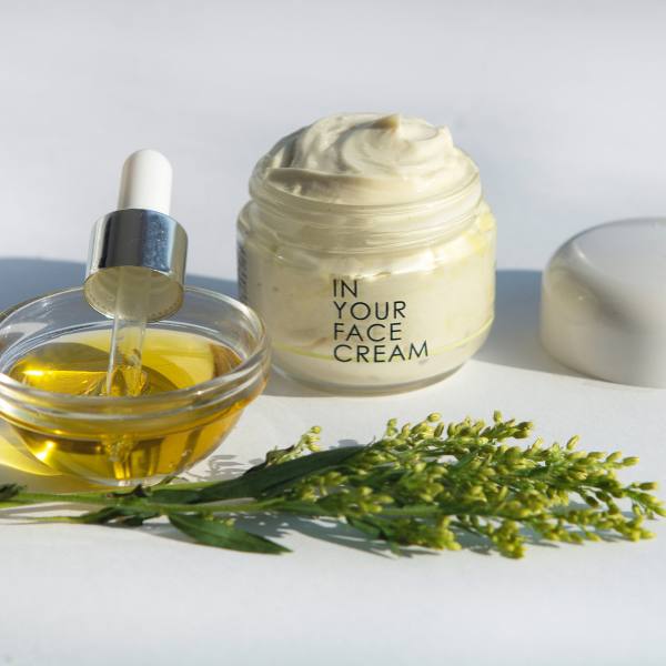 jar of CREAM with botanicals and oil