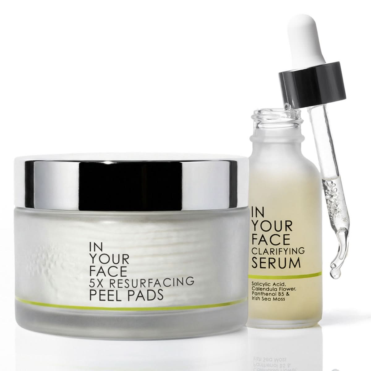 A skincare set featuring a jar of IN YOUR FACE 5X RESURFACING PEEL PADS with a silver lid, and a glass dropper bottle of IN YOUR FACE CLARIFYING SERUM with a black dropper cap, on a white background.