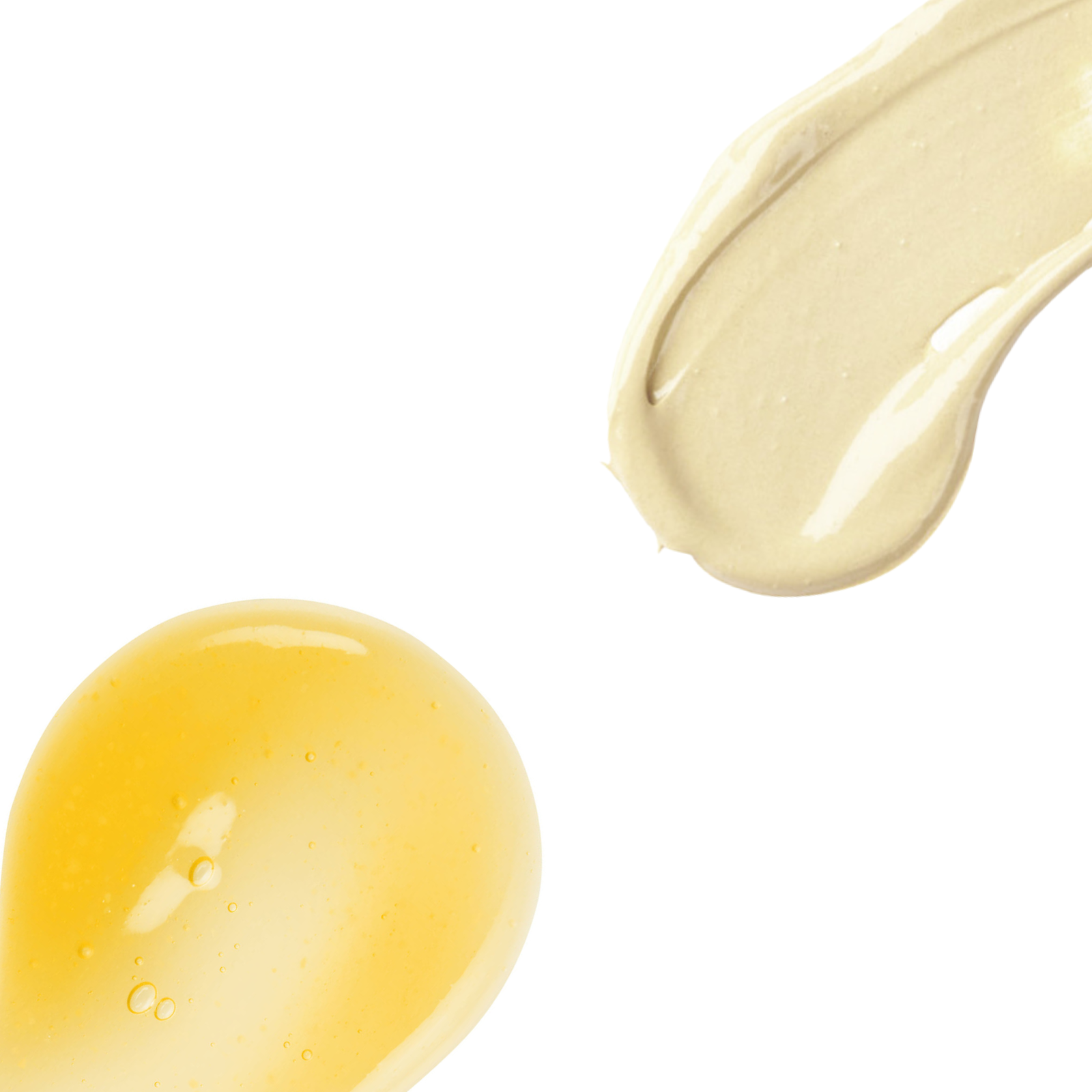CREAM & PLUMPING SERUM smears on white background.