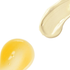 CREAM & PLUMPING SERUM smears on white background.