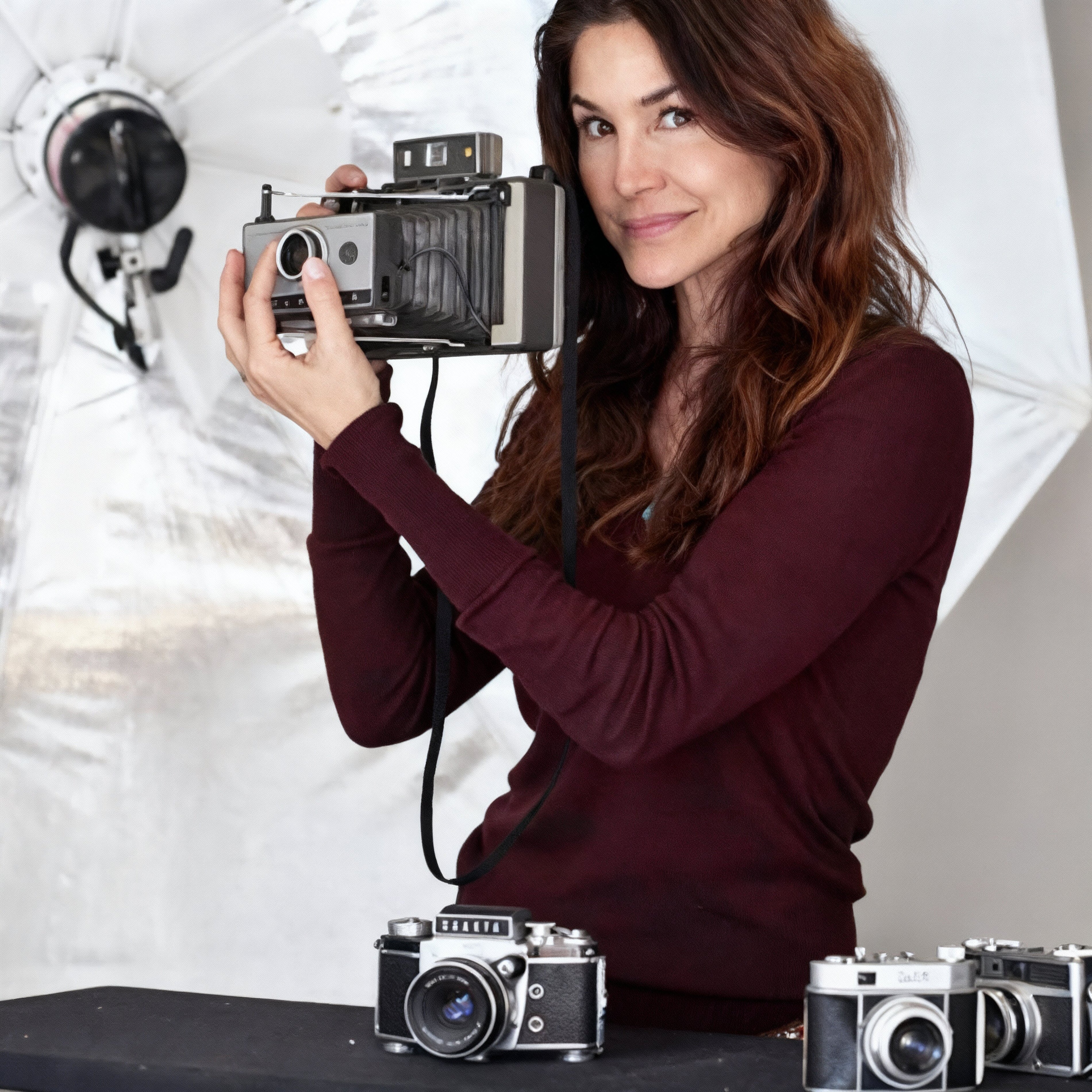 denice with vintage Polaroid Automatic Land Camera