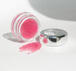 Photo of THE LIP POLISH in jar and texture