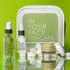 the IN YOUR FACE TRAVEL SET on a green background