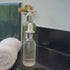 Denice Duff applying the CLARIFYING SERUM.