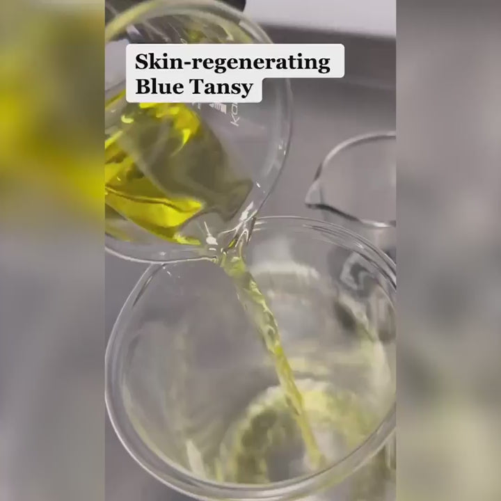 A video showing how the BLUE TANSY MIST is being created with Blue Tansy, Sea Algae, and Hyaluronic acid. Then it shows Denice Duff spraying it on her face and smiling.
