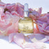 our nourishing oil among some peony petals 